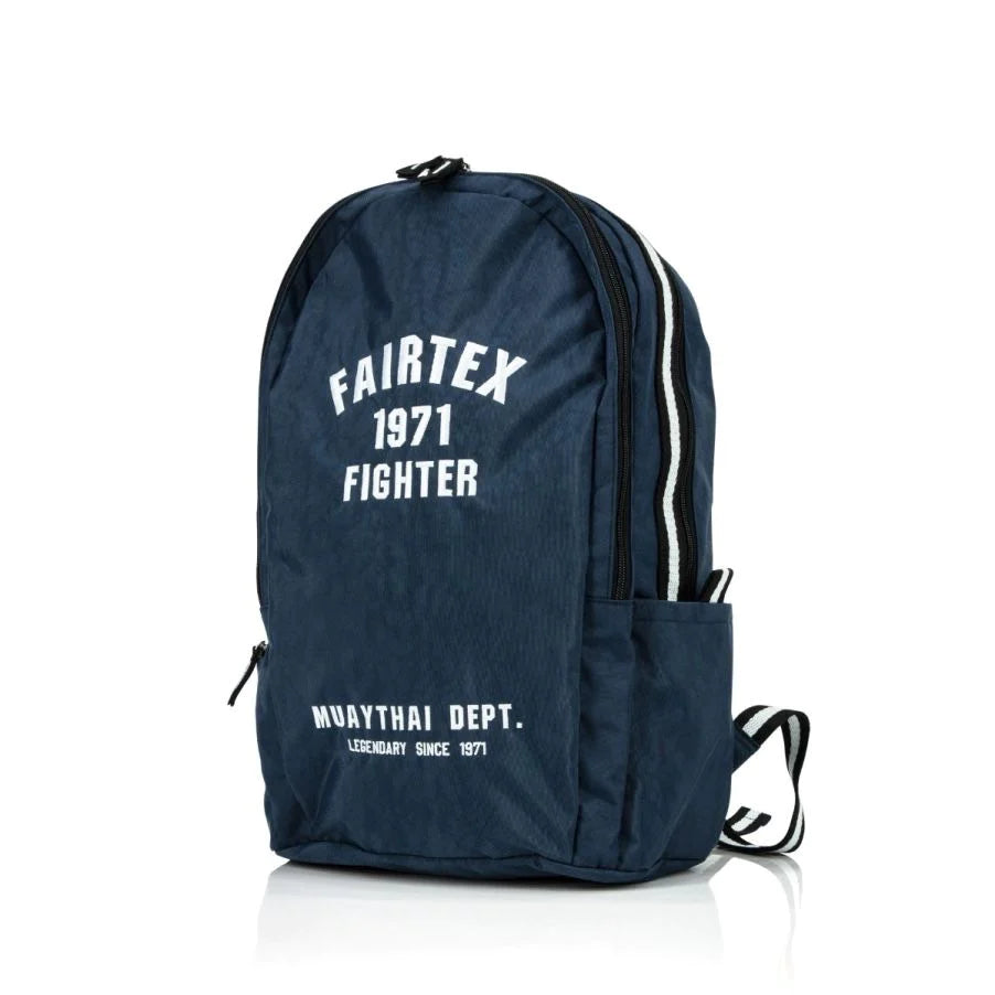 Navy blue Fairtex rucksack with white text, stripes, and 1971 fighter Muay Thai dept