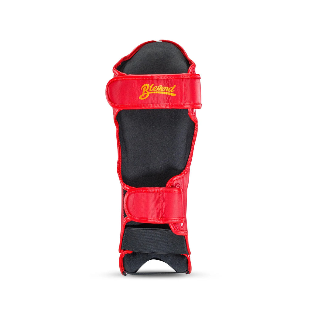 Red and black Blegend Shinguards with padded interior, adjustable straps, and Blauer logo