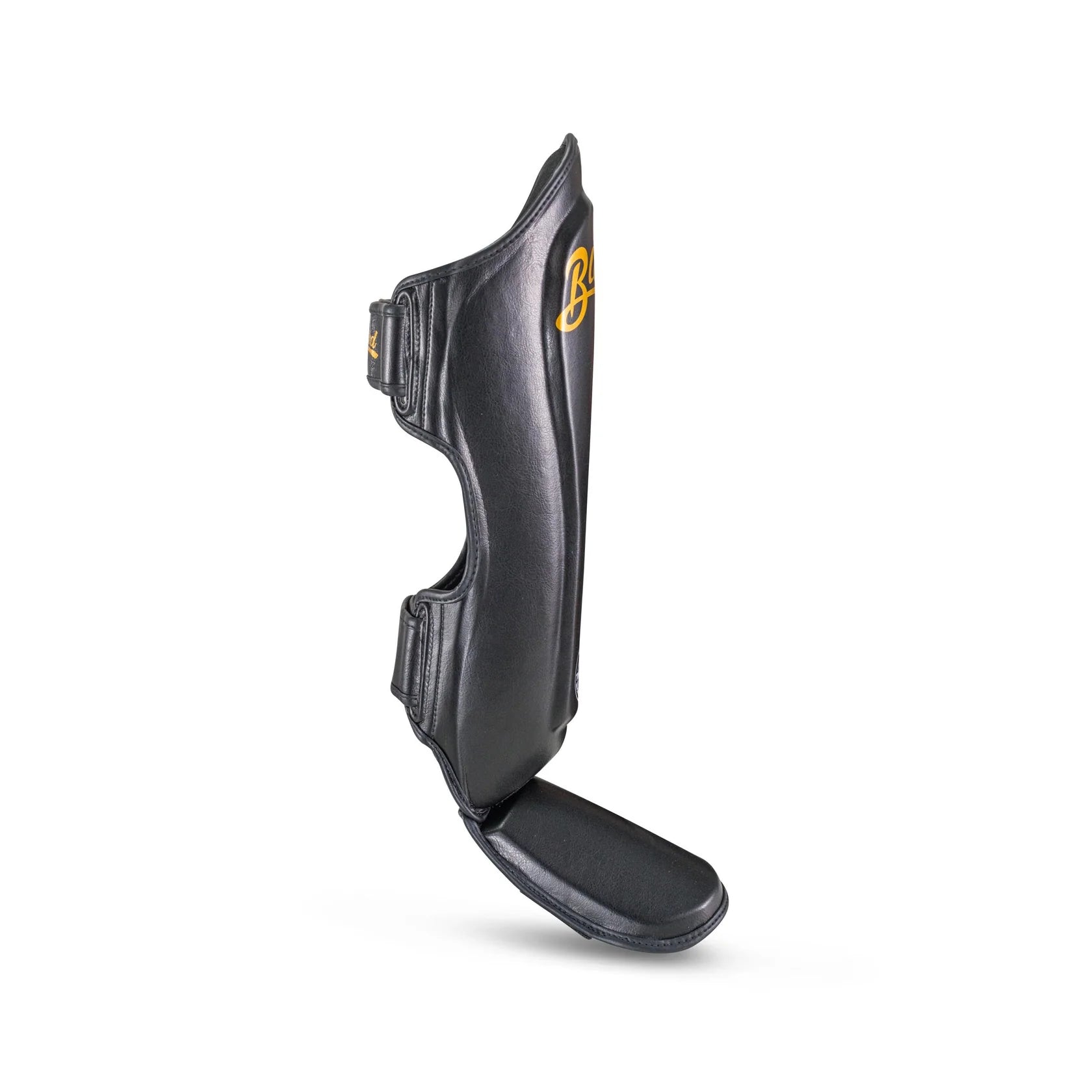 Blegend Shinguards Black: leather shin guard with gold accents and strap