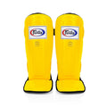 Fairtex Compact Shinguards in yellow with black accents and white logo