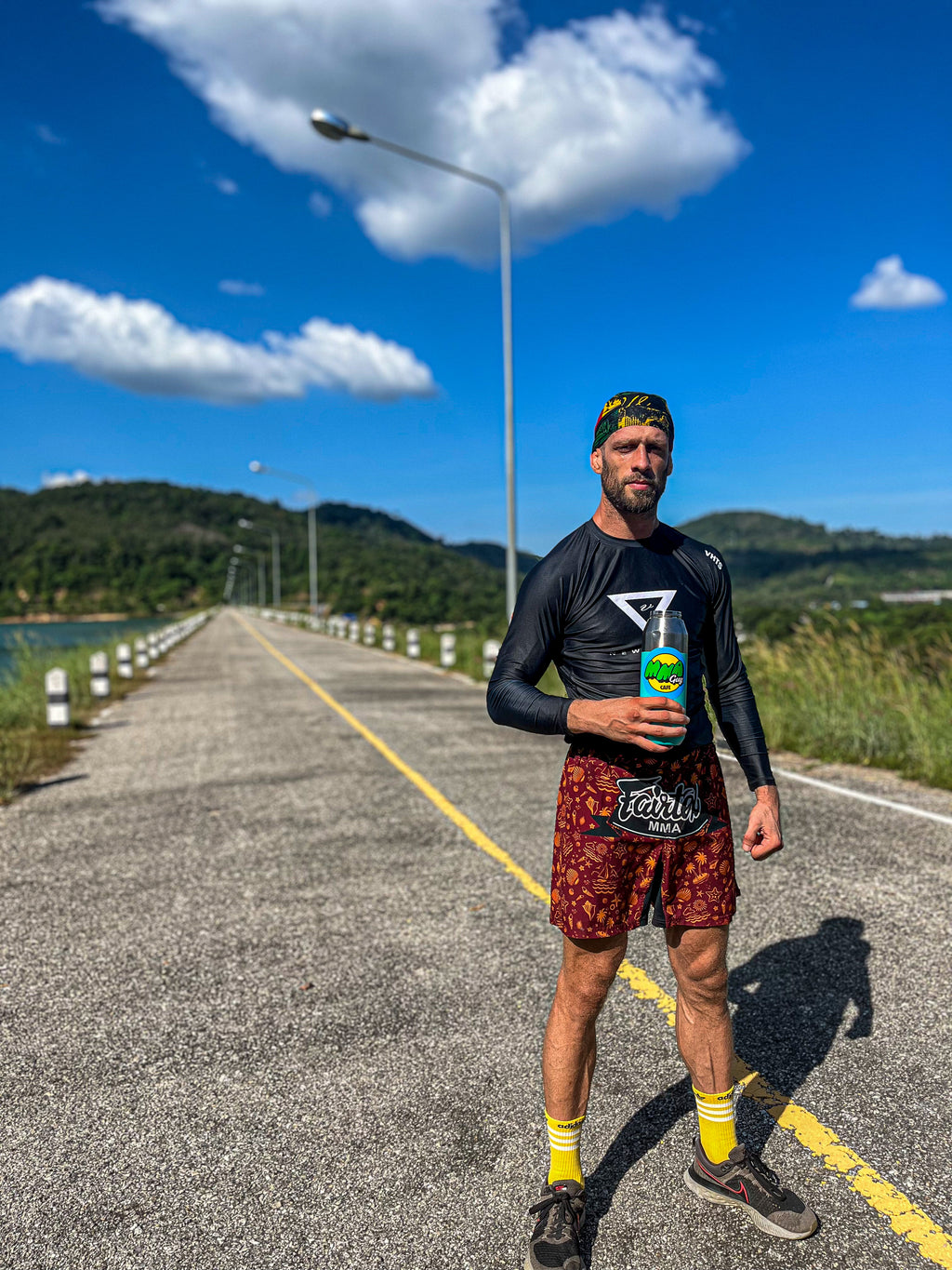 Green Gatorade bottle on Fairtex MMA Shorts Beach product