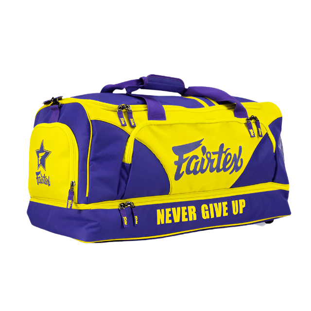 Fairtex BAG2 gym bag purple and yellow, angled view showing side pocket